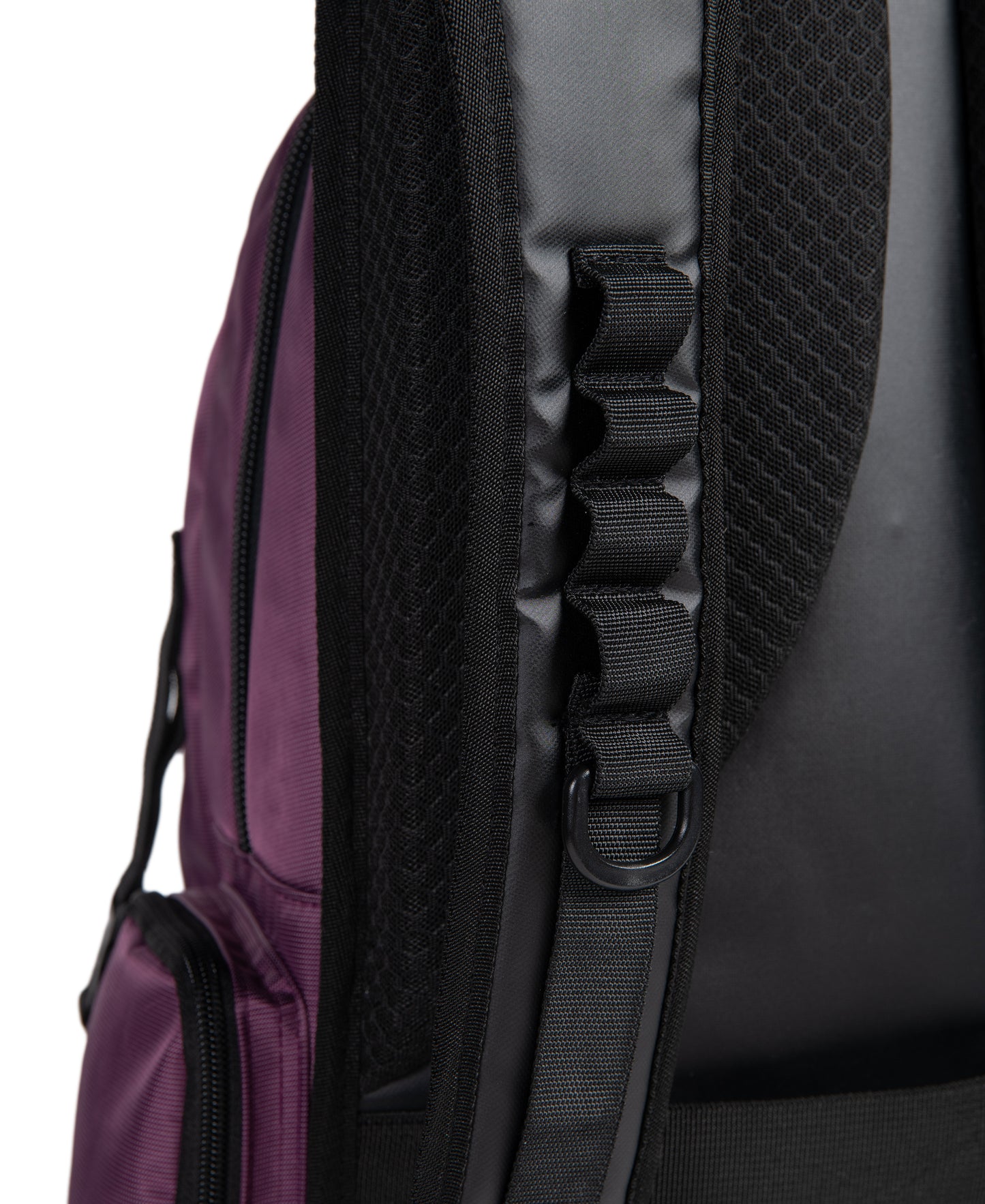 Close-up of the Arena All Set Sports Swim Backpack 45L - Plum by Arena, highlighting its padded black mesh shoulder strap, stitched handle, plastic D-ring, and part of the purple water-repellent side pocket with zipper.