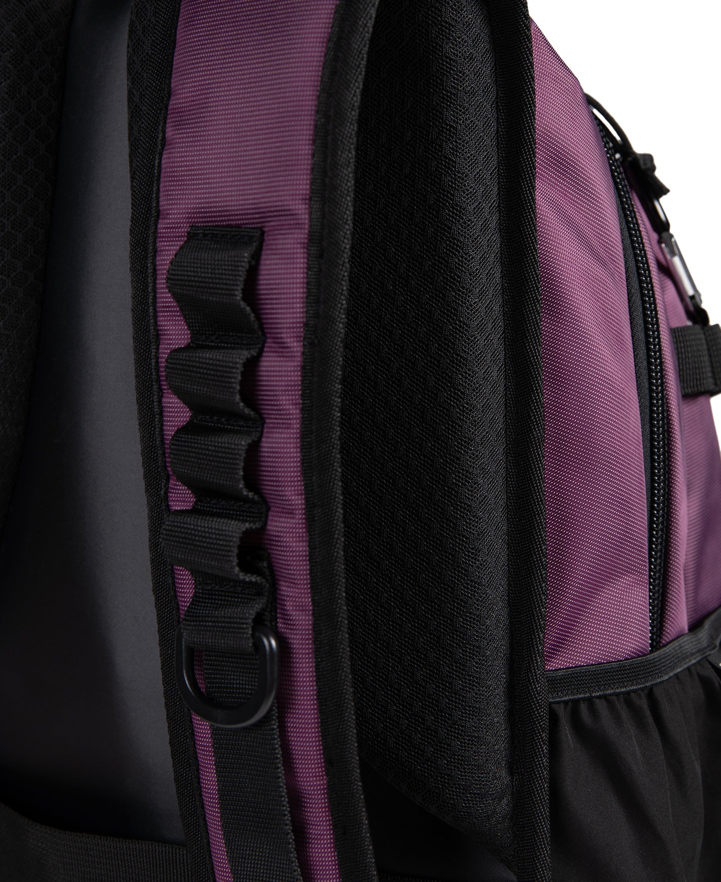 Close-up side view of the Arena All Set Sports Swim Backpack 45L in Plum, featuring padded mesh straps, a looped strap detail, water-repellent fabric, a D-ring, and part of a zippered pocket.